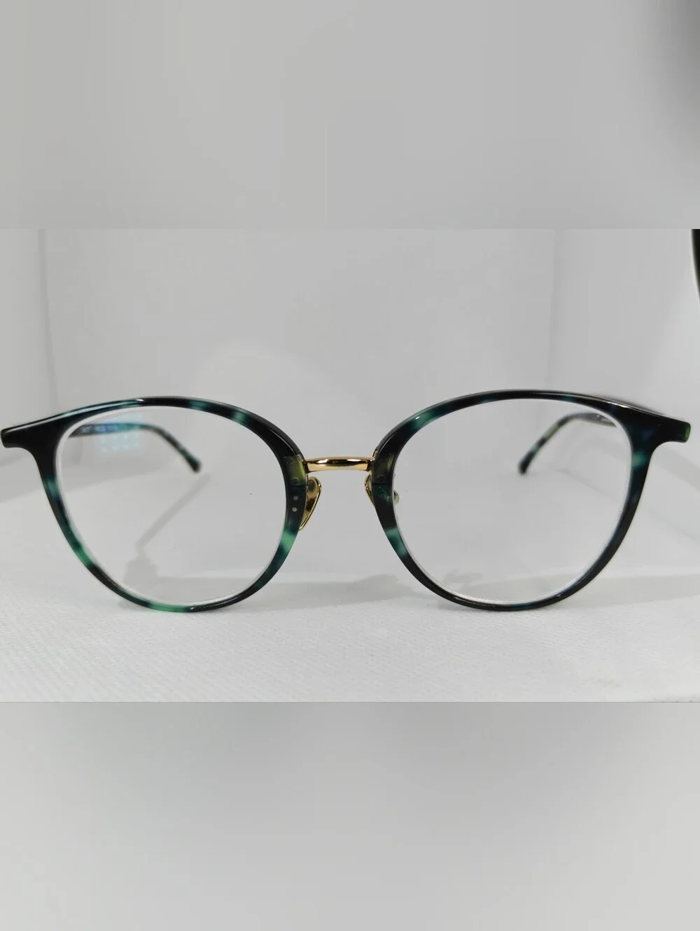 Aloft. Classic Round Women's Eyeglasses in Green Marble Tortoise Gold.